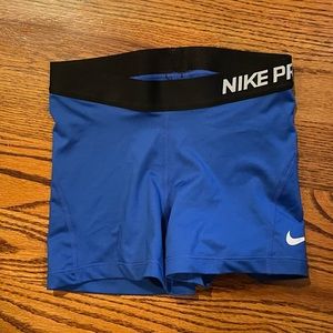 Blue Nike pro shorts